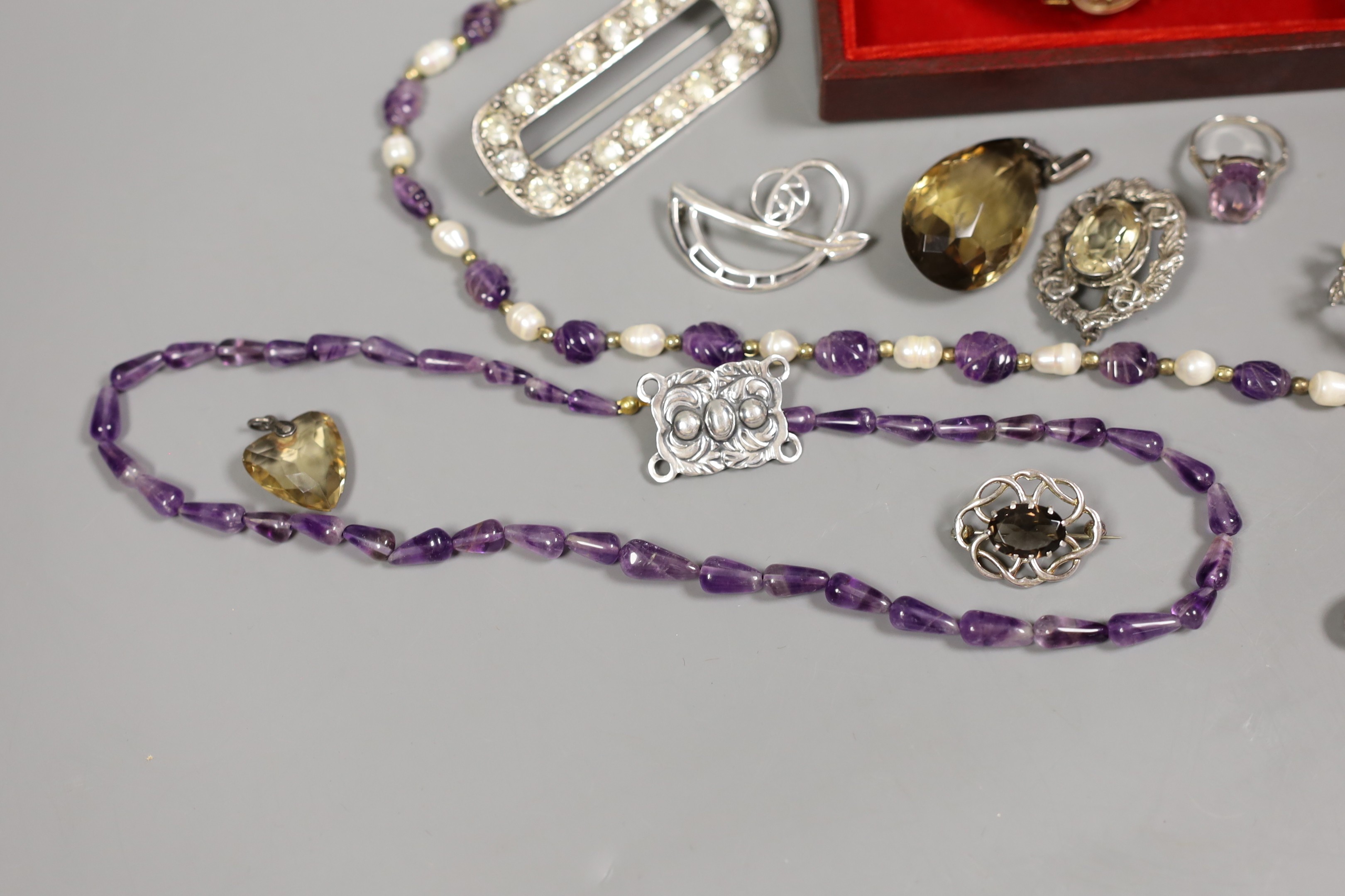 A late Victorian silver and paste set oval brooch, a lady's 9ct gold Buren manual wind wrist watch, an amethyst and freshwater? pearl necklace and other jewellery including amethyst ring and citrine set pendant.